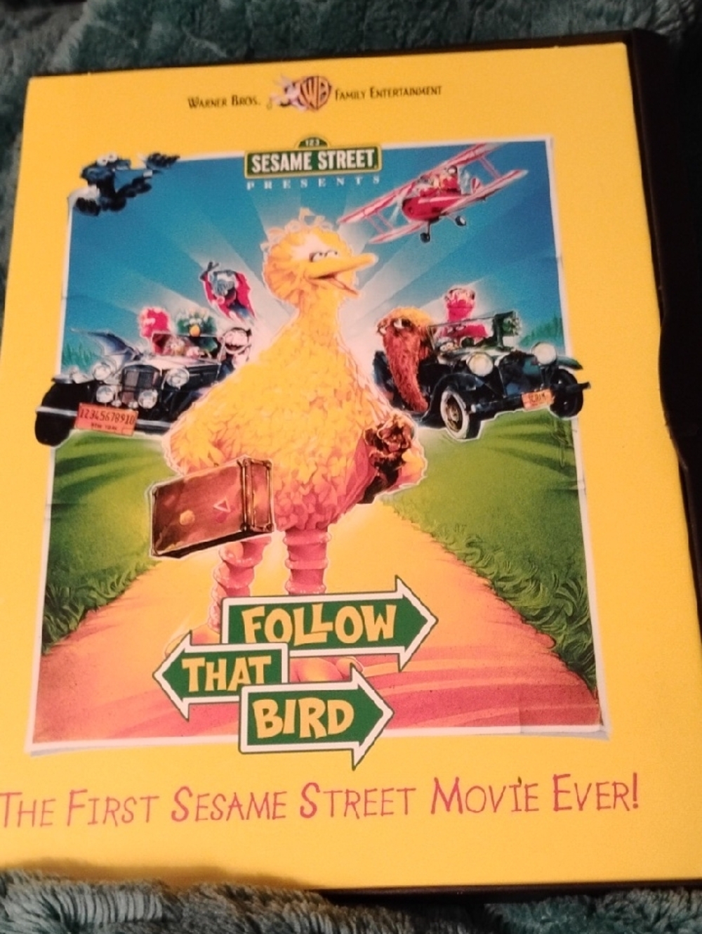 Sesame Street Follow That Bird Movie Cover - Yellow & Blue Artwork